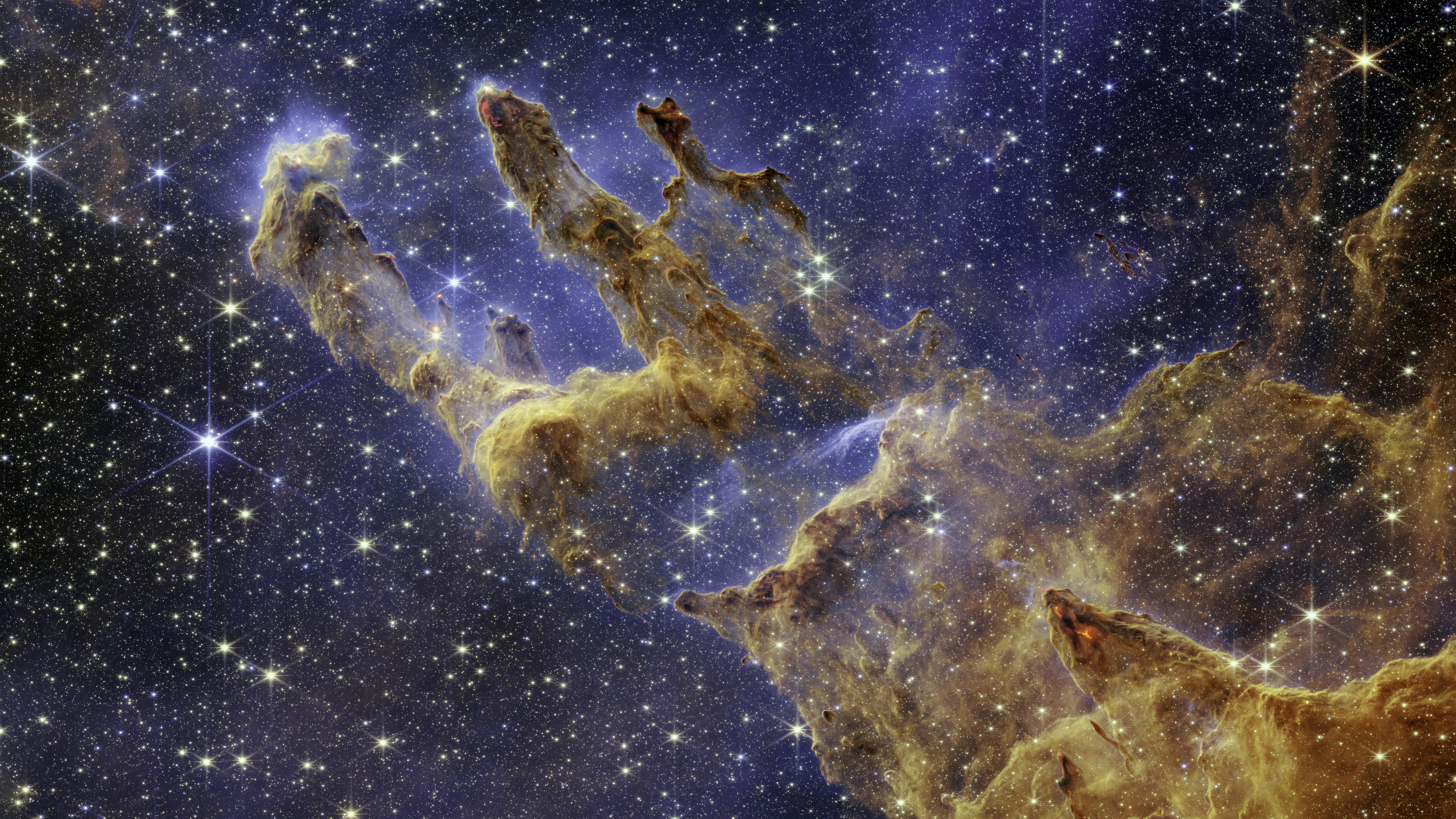 Pillars of Creation, a striking feature within the Eagle nebula